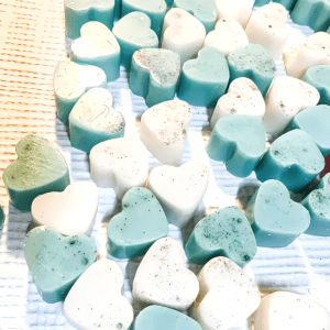 Highly scented Mini hearts wax melts. Highly scented home freshener. Luxury wax melt. Scoop able wax heart shaped melts. Long lasting aroma.